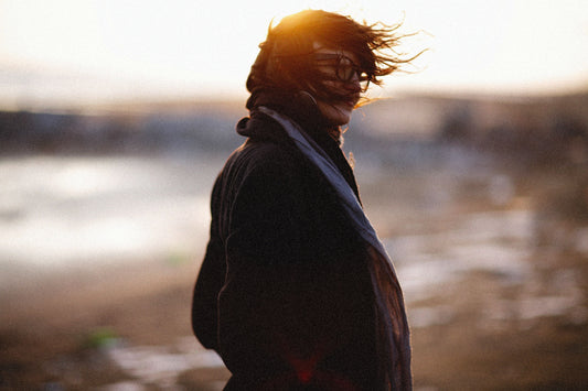 Person outdoors with their hair exposed to the sun